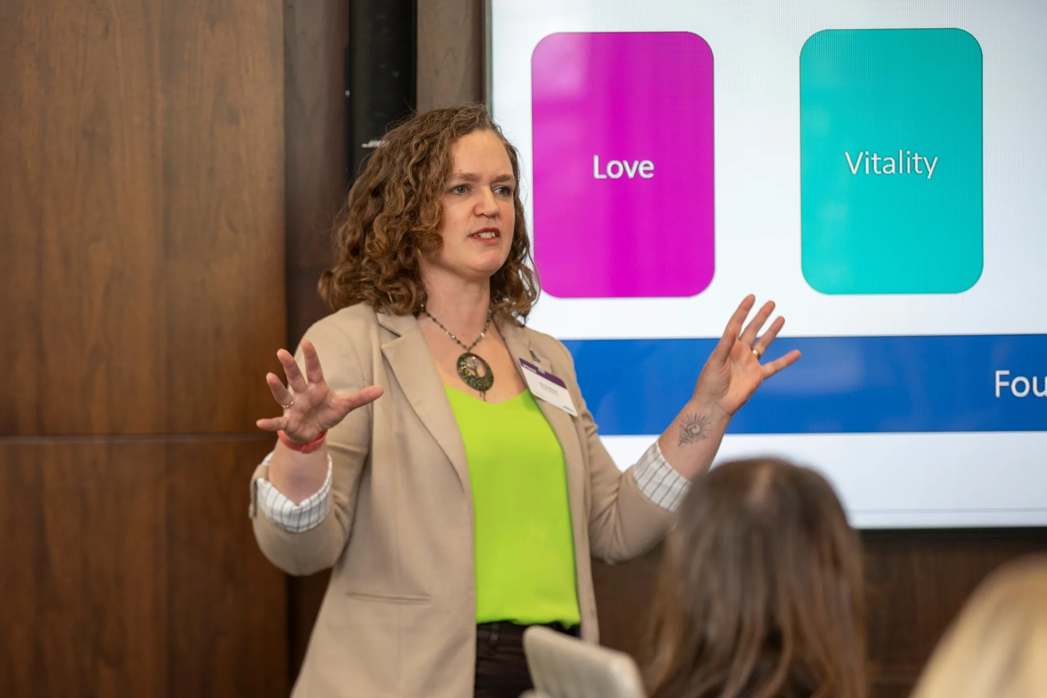 Jen Goddard facilitating a session at a professional event
